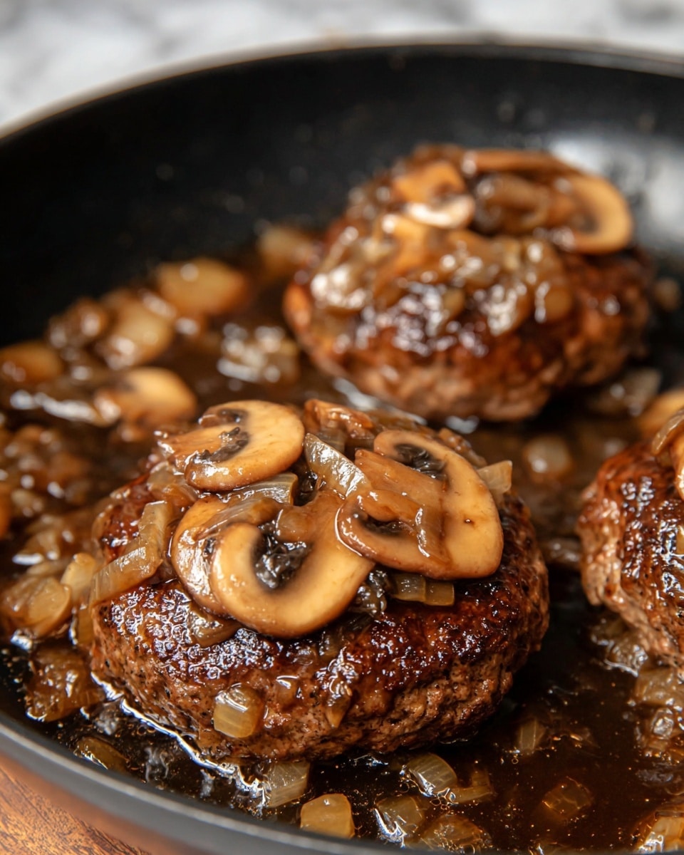 The image shows three brown, cooked hamburger patties in a black pan, each topped with a glossy sauce that contains light brown sliced mushrooms and translucent cooked onions. The sauce pools around the patties, giving a wet and shiny look, while the mushrooms have a slightly soft texture and the onions are diced and cooked to a light golden brown. The pan contrasts with the rich colors of the meat and toppings. The background features a white marbled texture. photo taken with an iphone --ar 4:5 --v 7