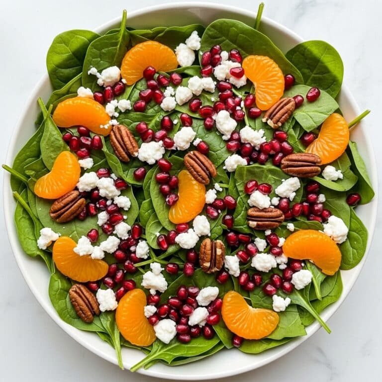 Christmas Spinach Salad with Cranberries, Oranges, and Pecan Nuts Recipe