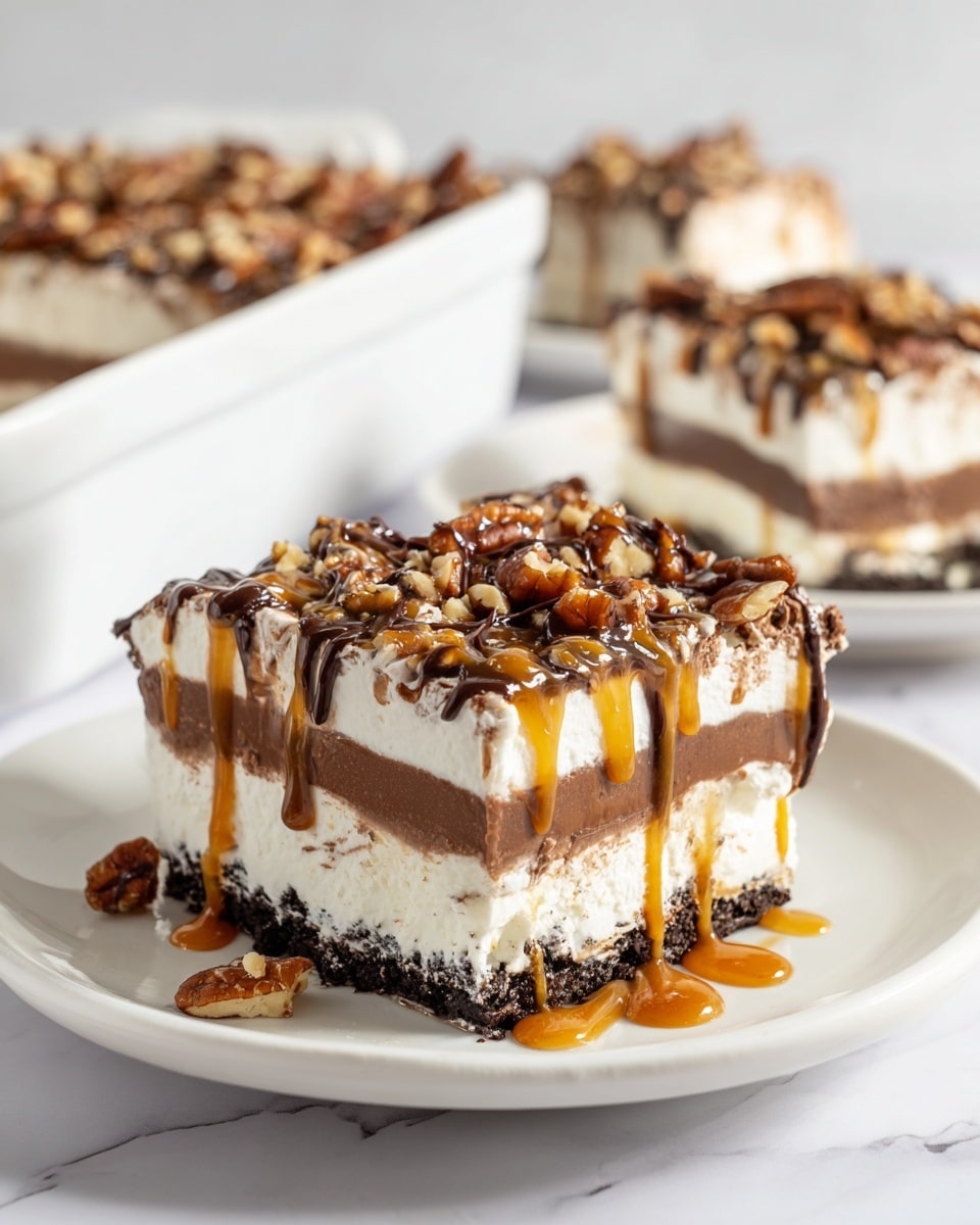 The image shows a slice of layered dessert on a white plate with a silver fork holding a bite of the dessert. The dessert has four distinct layers: the bottom dark crumbly cookie crust, the next thick white creamy layer, a smooth dark chocolate layer, and a top white creamy layer similar to the second. The top is covered in pecan nuts and drizzled with caramel and chocolate sauce, some dripping down the sides. In the background, there is a white dish with more of the dessert and another white plate with another slice, all set on a white marbled surface. photo taken with an iphone --ar 4:5 --v 7